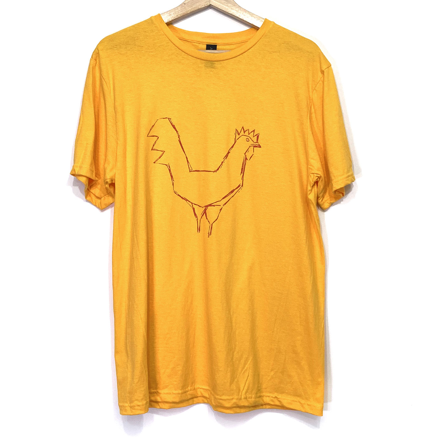 A red chicken silkscreen on the front of a bright yellow tee