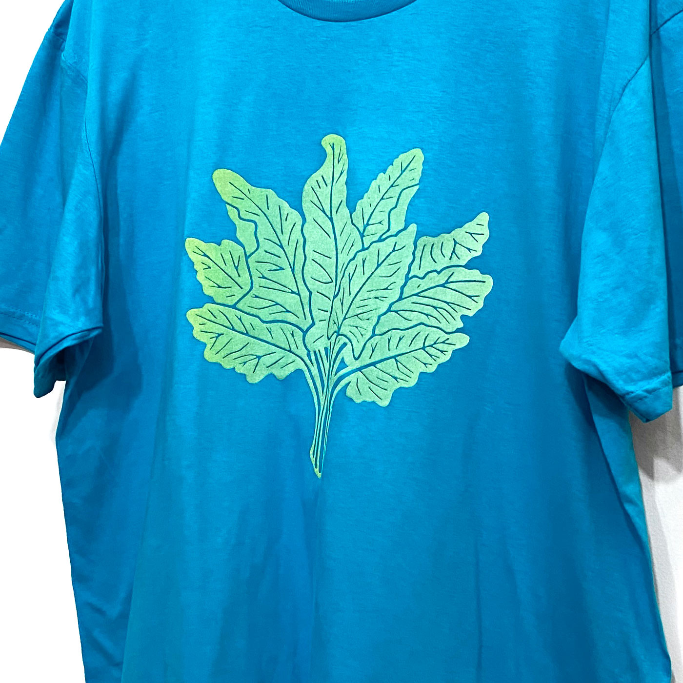 Green Swiss Chard on Turquoise T-Shirt